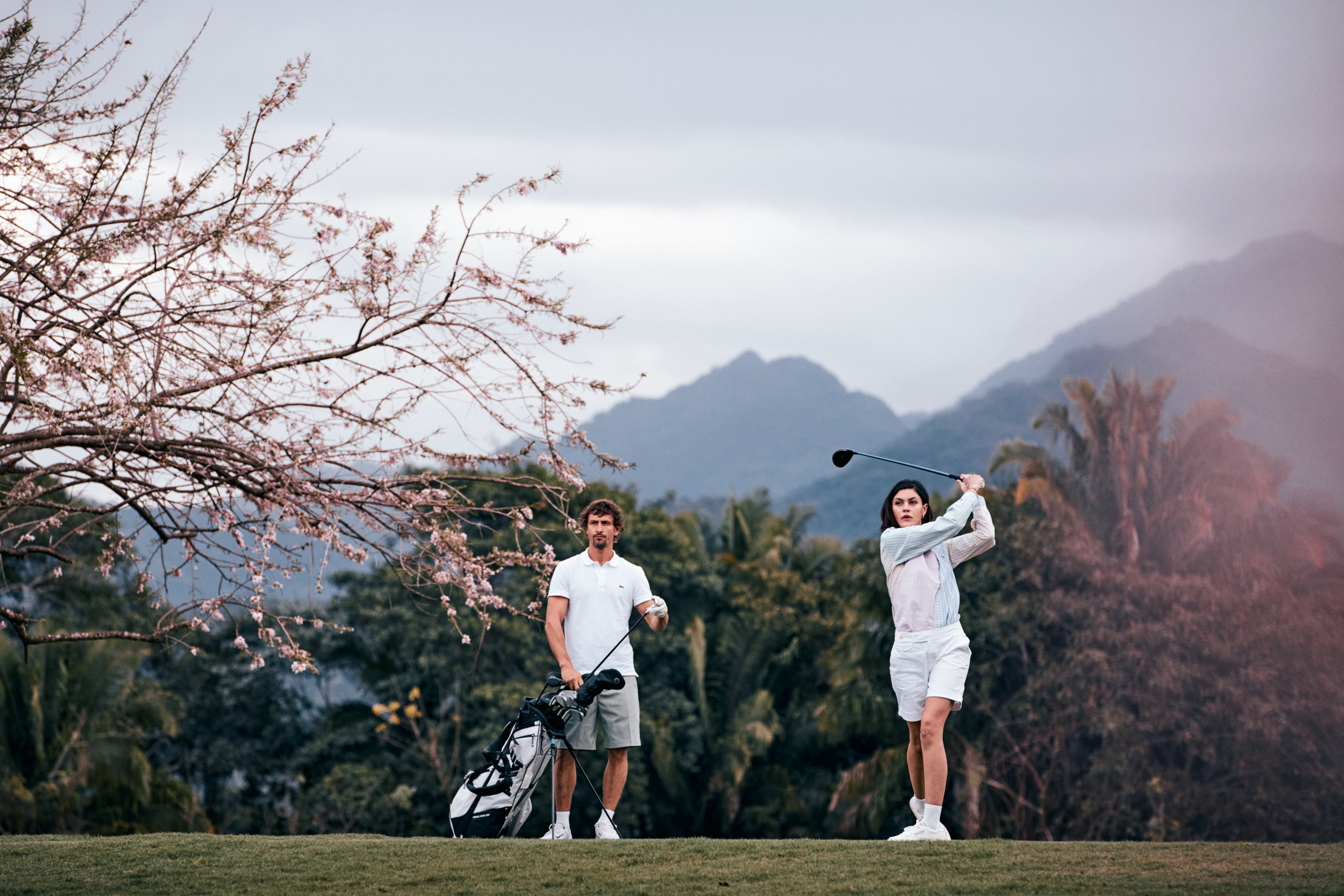 Couple playing golf